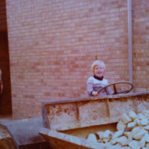 Circa 1974, Helen on a digger outside our family home